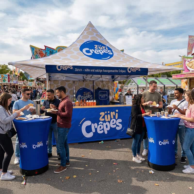 People eating at inflatable table stands