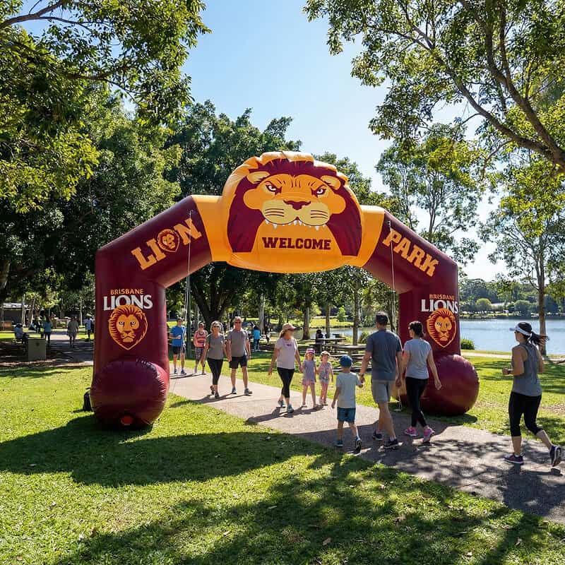 People walking through inflatable archway